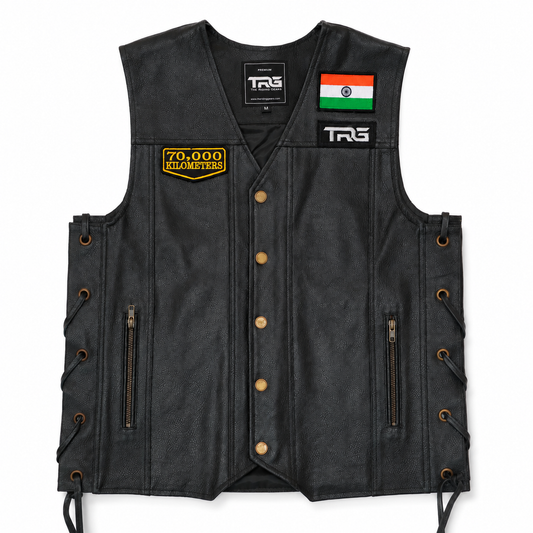 70 Thousand Kilometres embroidered patch displayed on black leather riding vest with Indian flag patch