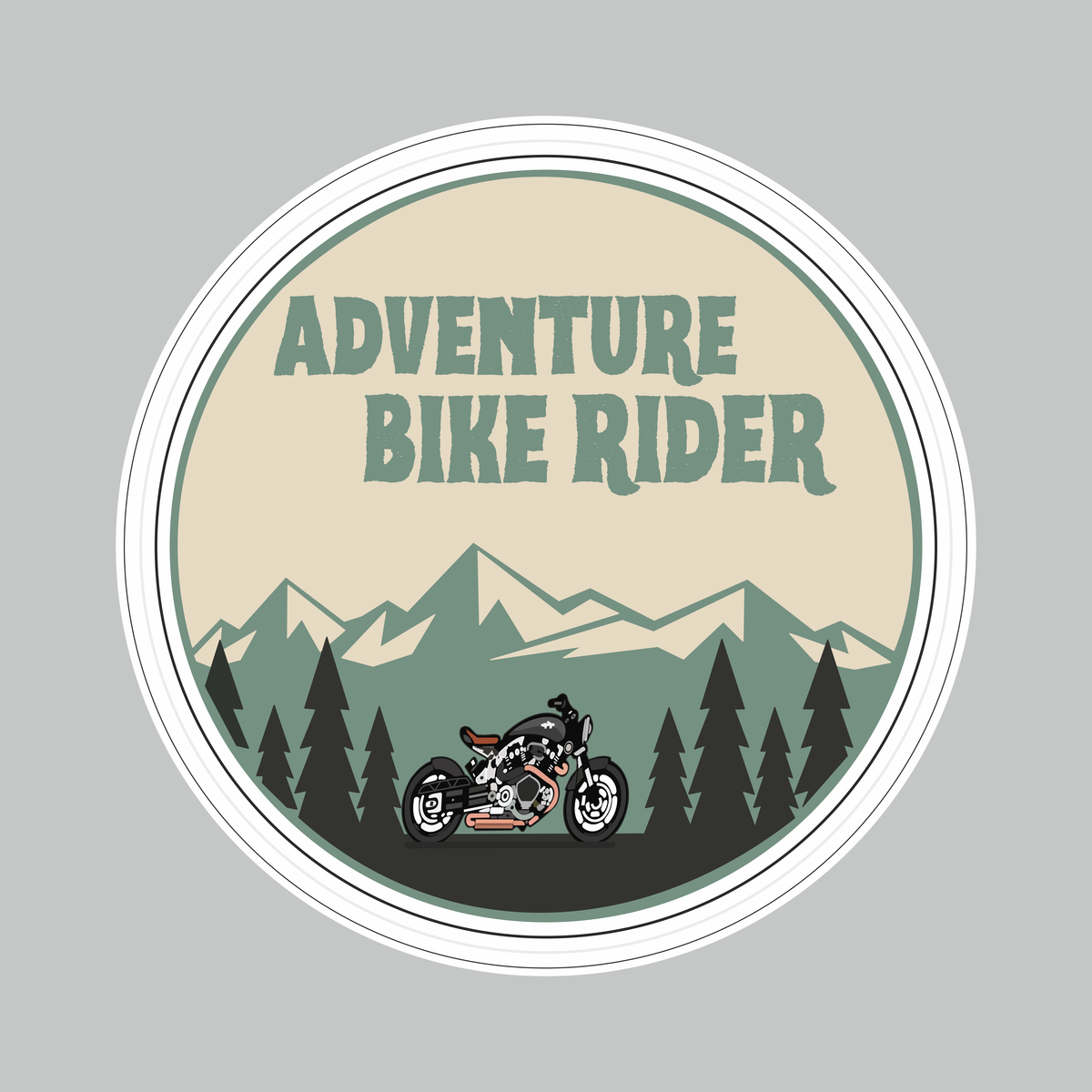 Round Adventure Bike Rider Sticker featuring motorcycle, mountain and pine forest artwork in beige, green and black