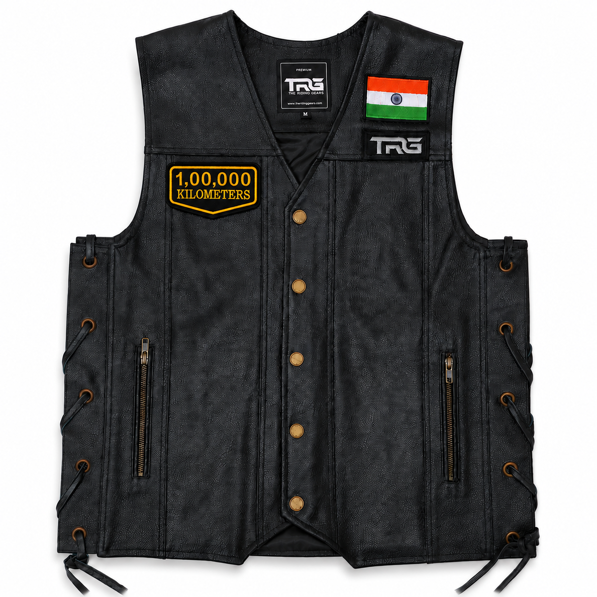 1 Lakh Kilometres embroidered patch attached to black leather motorcycle vest on white background