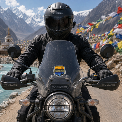 Adventure motorcycle sticker applied to adventure bike windshield on Himalayan mountain road