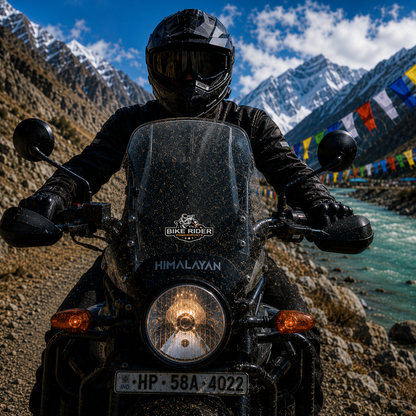 Bike Riders Powersports Sticker centered on Royal Enfield Himalayan motorcycle windshield with Himalayan mountains and river in background