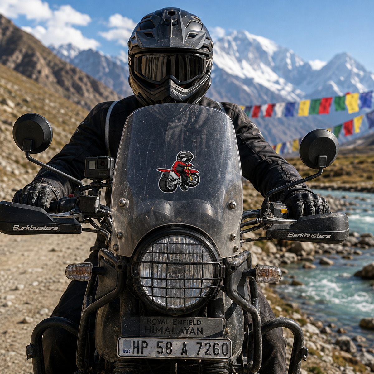 Biker Stop Look Behind red motorcycle rider sticker installed centered on Royal Enfield Himalayan windshield in mountain riding setting