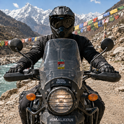 Difficult Roads adventure sticker installed on Royal Enfield Himalayan motorcycle windshield on a Himalayan mountain ride