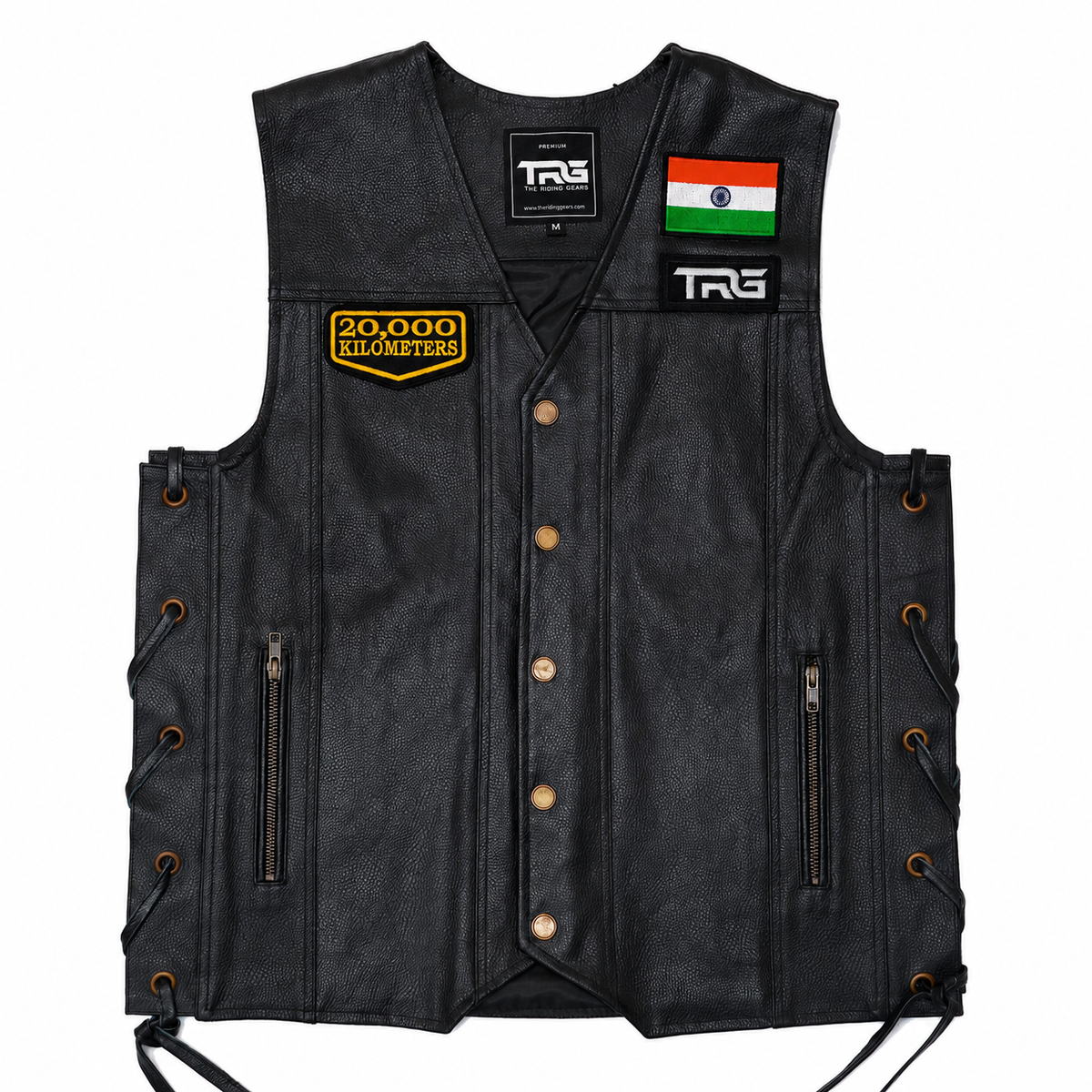 20 Thousand Kilometres embroidered patch attached to chest of black leather motorcycle vest on white background