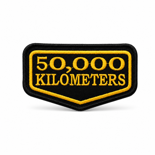 50 Thousand Kilometres Embroidered Patch 2 × 4 Inches – Iron On / Sew On