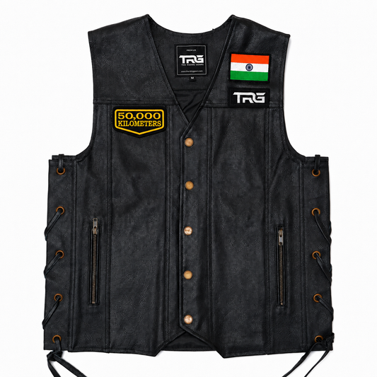 50 Thousand Kilometres embroidered patch displayed on black leather riding vest with Indian flag patch