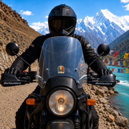 Motorcycle sticker displayed on Royal Enfield Himalayan windshield with rider on scenic Himalayan mountain road