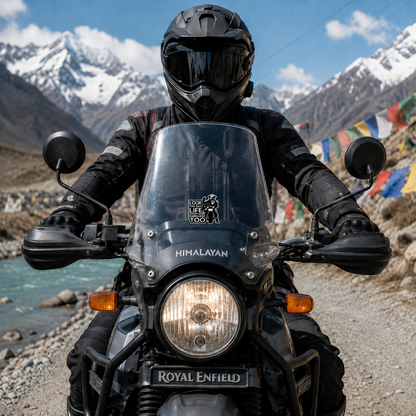 Look and Save a Life Bikers Have Families Too sticker centered on Royal Enfield Himalayan motorcycle windshield in Himalayan riding setting