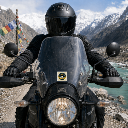 Skeleton King Fell Sticker displayed on motorcycle windshield with rider on Himalayan mountain road