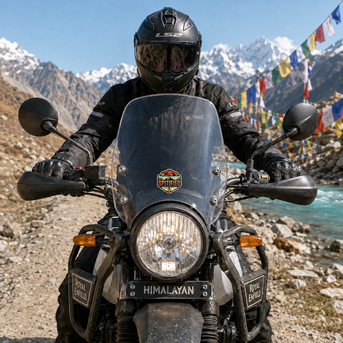 Spitified adventure motorcycle sticker displayed on motorcycle windshield in Himalayan mountain setting