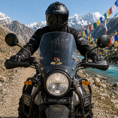 Stay Wild motorcycle sticker displayed on adventure motorcycle windshield in Himalayan mountain setting