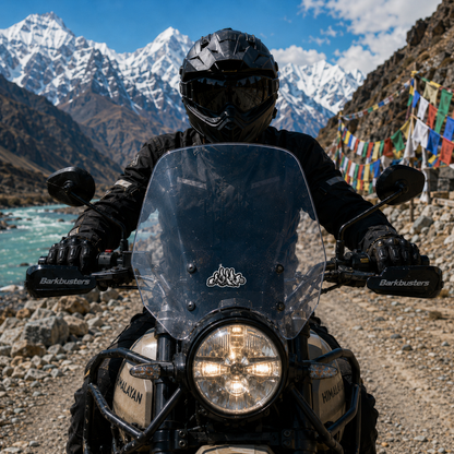 Ride Cycling on Hill sticker displayed on motorcycle windshield with rider on scenic Himalayan mountain road