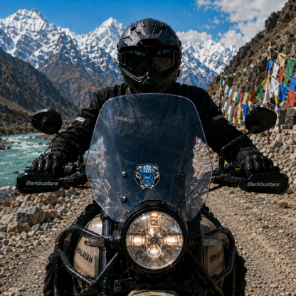 Ride Fast Motorcycle Club 1975 biker sticker displayed on motorcycle windshield with rider on Himalayan mountain road