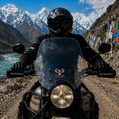 Ride Free eagle biker sticker displayed on an adventure motorcycle windshield in a Himalayan mountain riding setting