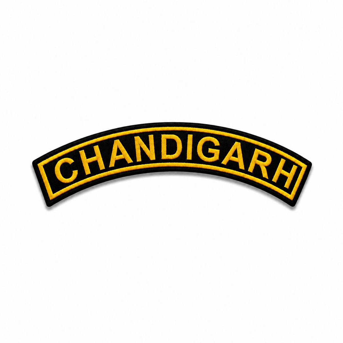 Chandigarh Top Curved embroidery patch in black and yellow with a curved shape shown on a clean white background.