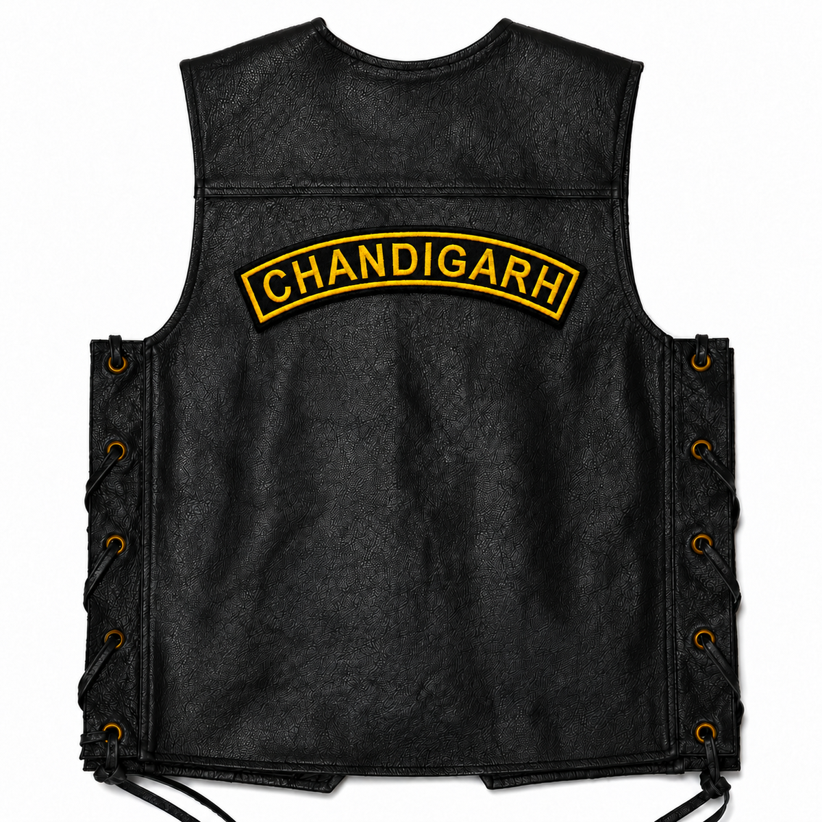 Black leather vest back view featuring the Chandigarh Top Curved embroidery patch placed across the upper back on a white background.