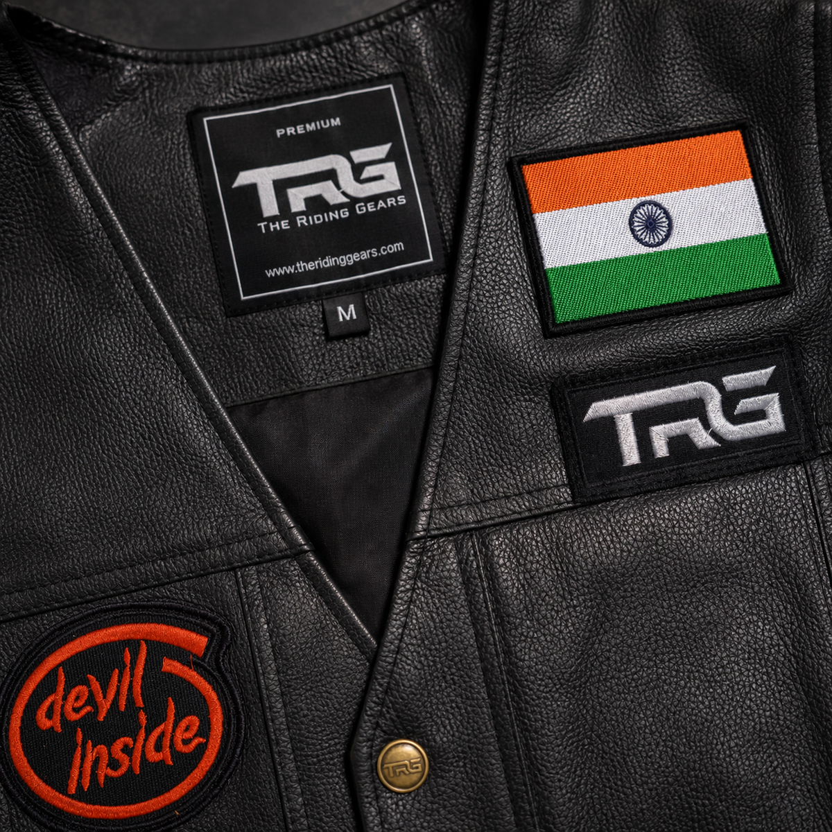 Devil Inside Biker Patch close-up showing red embroidery on black leather motorcycle vest
