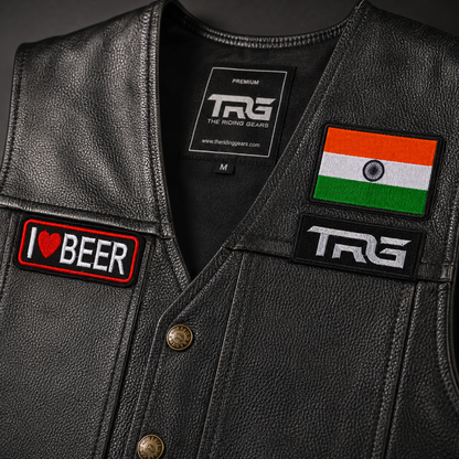I Love Beer close-up showing detailed red white and black embroidery on black leather riding vest.