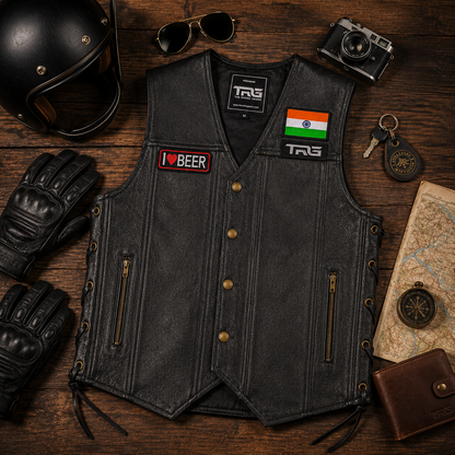 I Love Beer embroidered patch displayed on black leather vest with motorcycle helmet, gloves, keys and riding accessories.