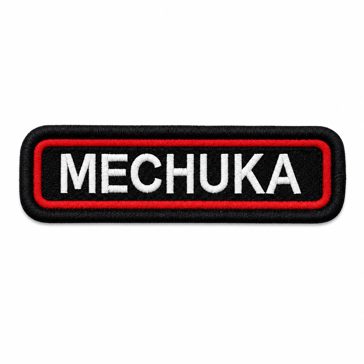 Mechuka embroidered patch with white lettering, red inner border, and black background on white backdrop.