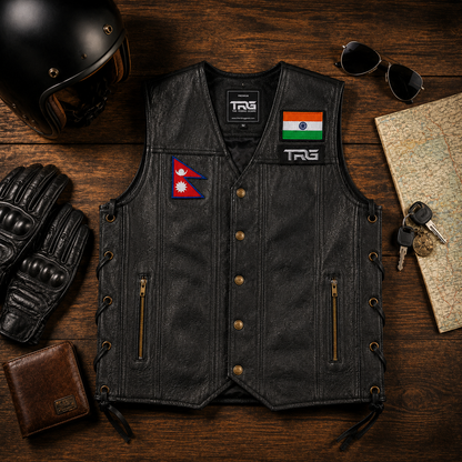 Nepal Flag Embroidery Patch displayed on a black leather riding vest in a flat lay with motorcycle accessories