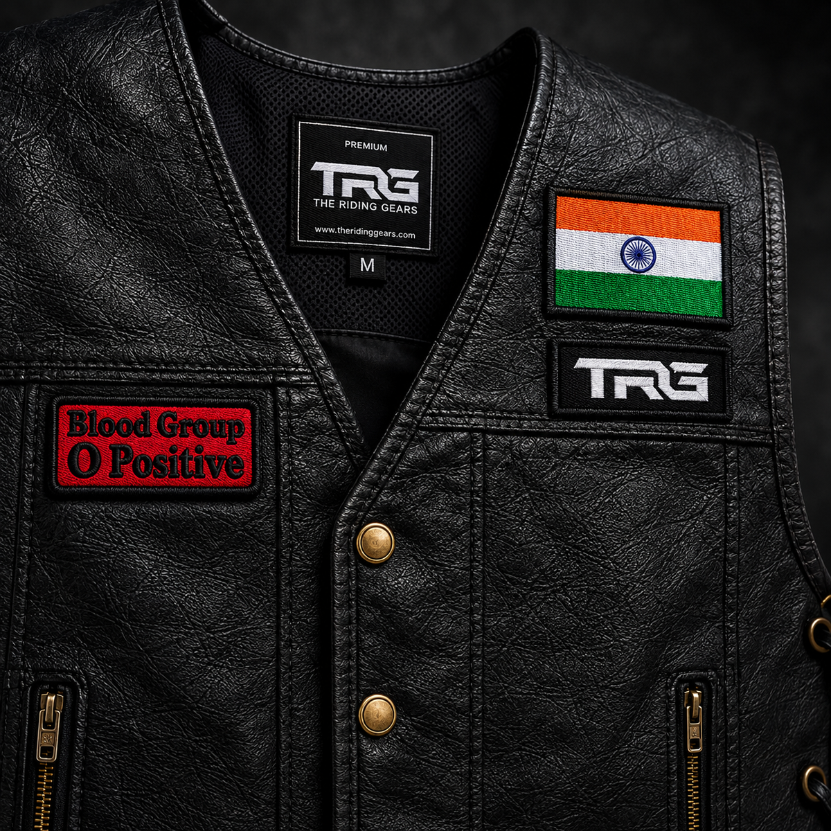 O Positive Blood Group Patch close-up showing red and black embroidery on leather riding vest