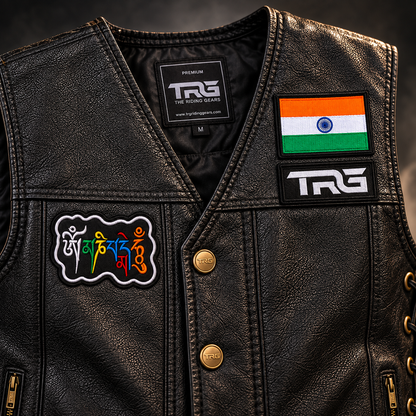 Om Mani Padme Hum Biker Patch close-up showing multicolor embroidered mantra design on black leather vest