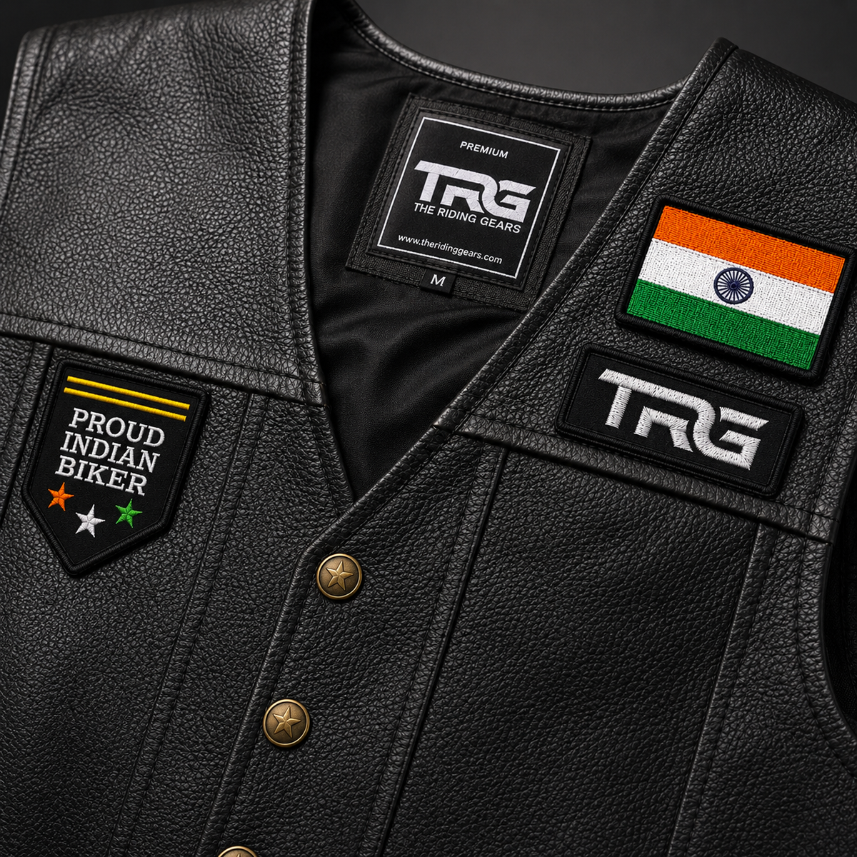 Proud Indian Biker Patch close-up showing white lettering and orange white green star embroidery on leather vest