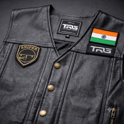 Sniper Biker Patch close-up showing gold embroidery on black leather motorcycle riding vest