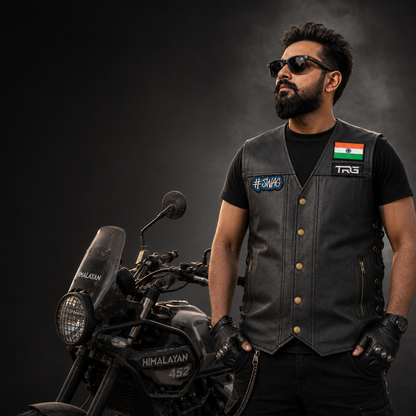 SWAG Biker Patch worn on black motorcycle vest by rider beside adventure motorcycle