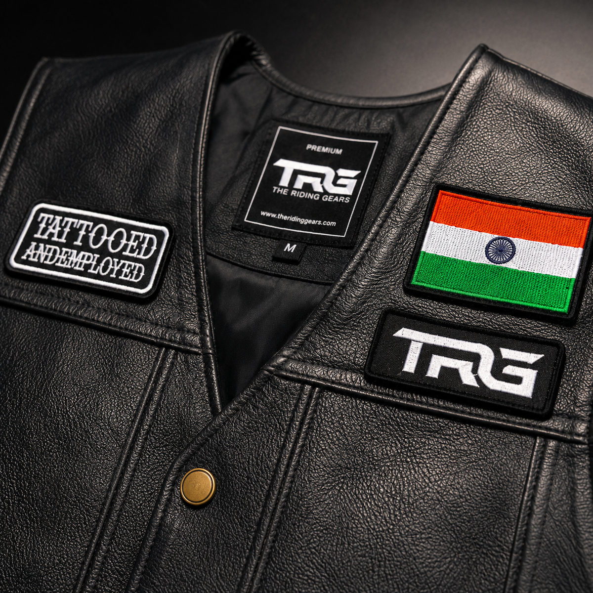 Tattooed and Employed Biker Patch close-up showing white embroidery on black motorcycle vest